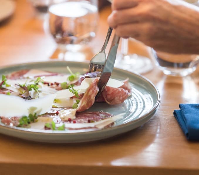 A lunch dish at Earl: cured meat and shaved cheese