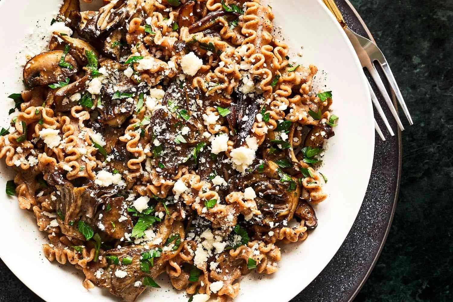 Mafaldine with Black Truffle Butter and Mushrooms